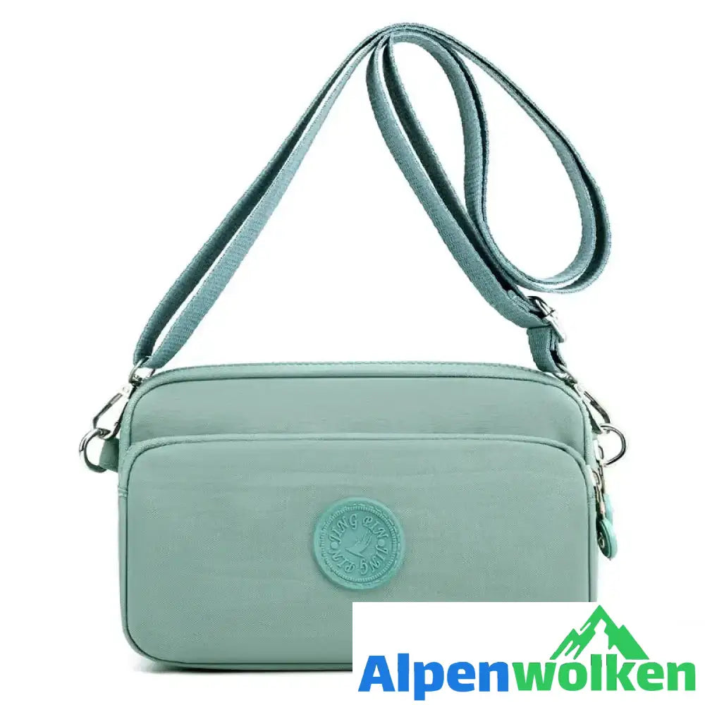 Alpenwolken - Damen leichte funktionelle Umhängetasche mit mehreren Taschen grün