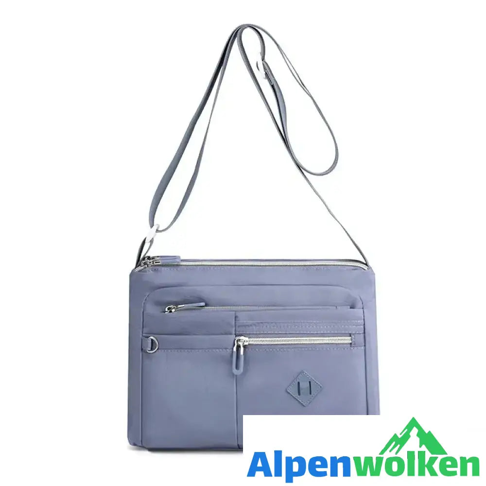 Alpenwolken - Leichte Schultertasche mit mehreren Taschen für Damen Hellblau